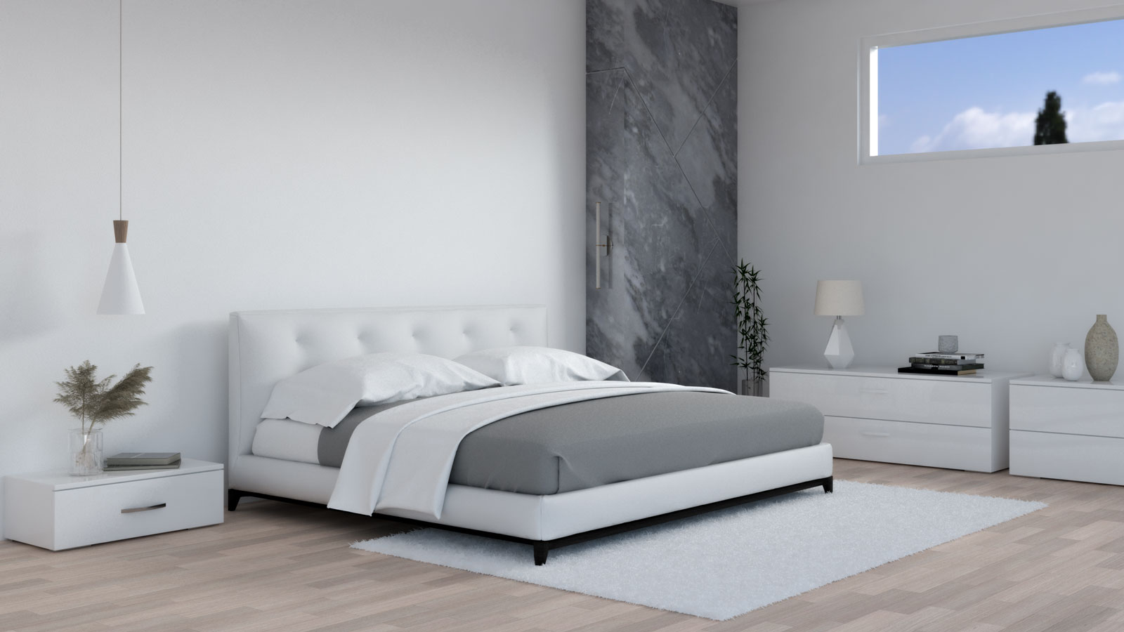 White and gray bedding in white bedroom