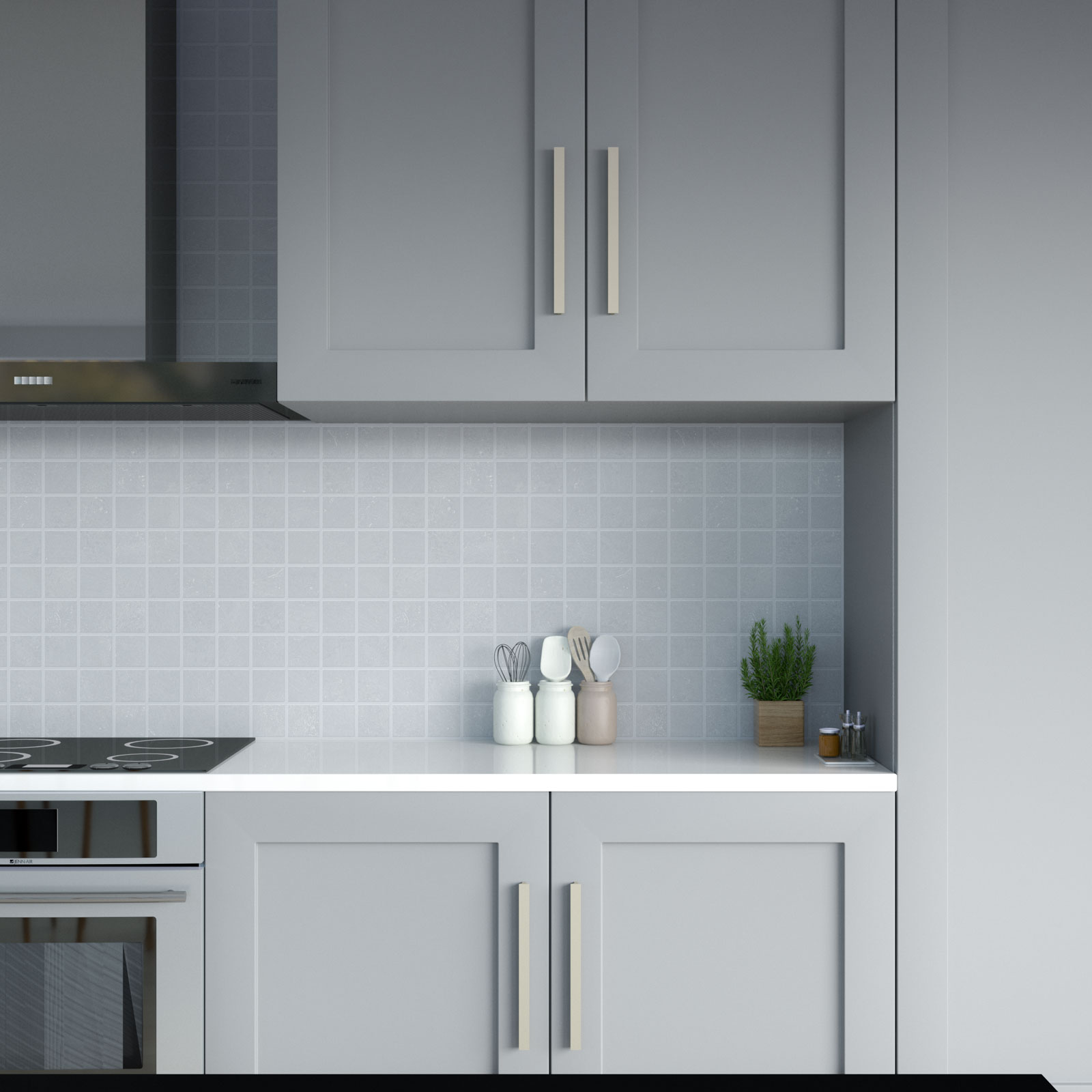 Plain white quartz countertops with gray cabinets